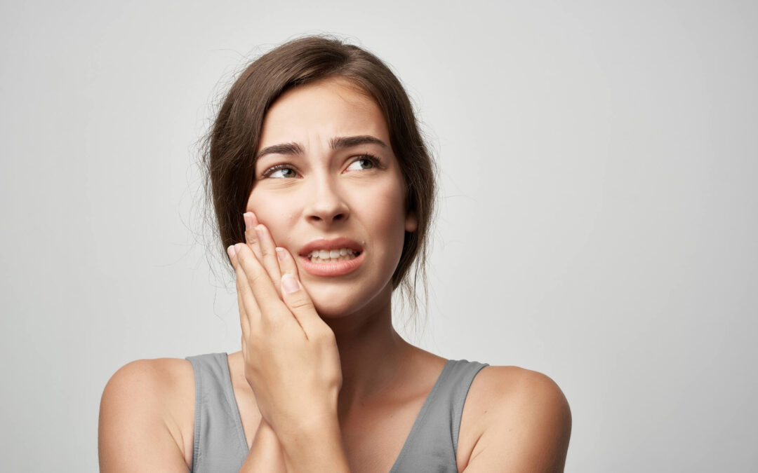 Lady Grabbing Jaw Dysfunction Pain Headache