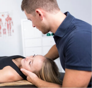 Physiotherapist treating patient for vestibular migraine vs cervicogenic dizziness